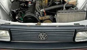 GRADE E MOLDURA FAROL PASSAT