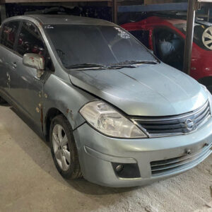 Pára-choque dianteiro e grade do tida 1.8 2008